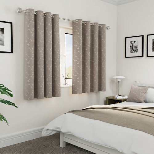 Tivoli Natural curtains in a bedroom