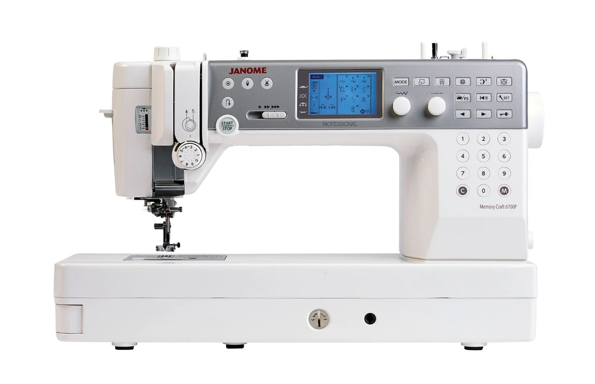 Janome Memory Craft 6700P long arm sewing machine